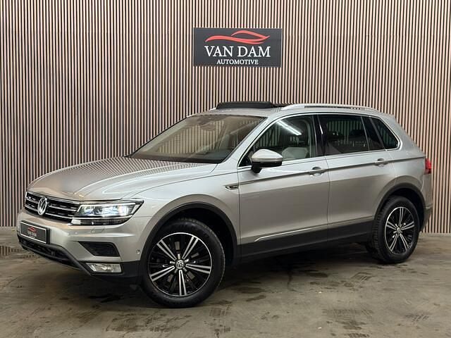 Grijs (metallic) Occasion 2017 VW Tiguan Highline SUV | € 20.900 (Super prijs) - Afbeelding 1/4