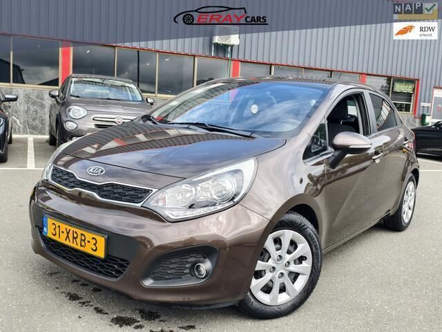 Bruin, metallic lak Gebruikt 2012 Kia Rio Plus Hatchback | € 5.999 (Eerlijke prijs) - Afbeelding 1/4