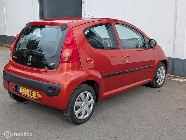 Occasion Peugeot 107 68 PK (50 kW) 2009 Oranje (metallic) Hatchback