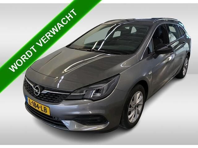 Grijs, metallic lak Gebruikt 2021 Opel Astra Business Elegance Stationwagen | € 15.990 (Eerlijke prijs) - Afbeelding 1/4