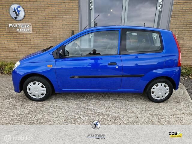 Occasion Daihatsu Cuore 59 PK (43 kW) 2008 Blauw Hatchback