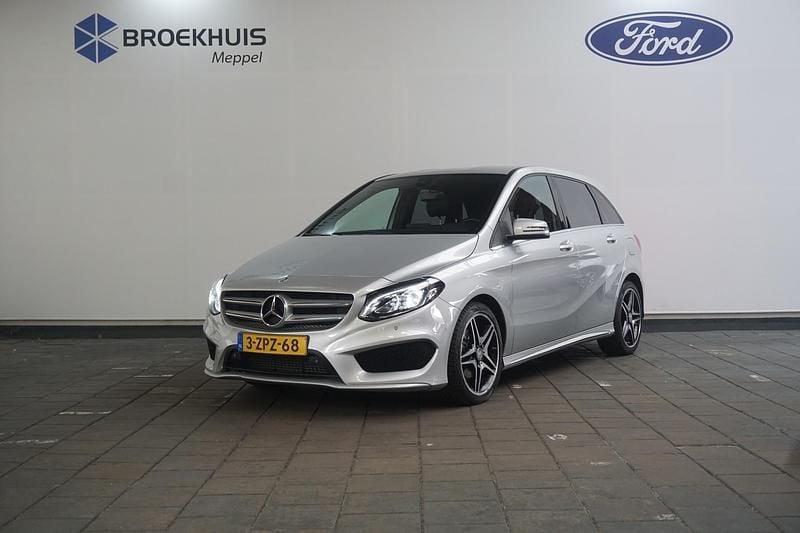 Grijs Gebruikt 2015 Mercedes B180 Ambition MPV | € 16.895 (Eerlijke prijs) - Afbeelding 1/4