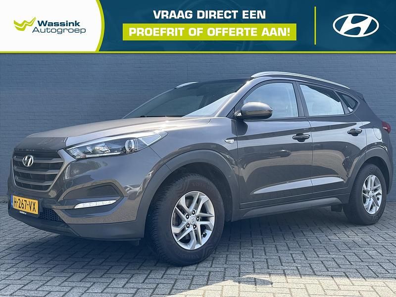 Bruin, metallic lak Gebruikt 2018 Hyundai Tucson Comfort SUV | € 19.590 (Eerlijke prijs) - Afbeelding 1/4