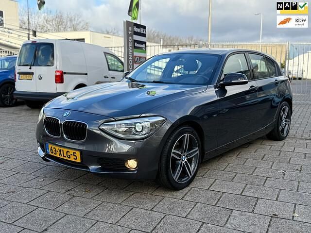 Grijs Gebruikt 2012 BMW 116 Hatchback | € 6.499 (Eerlijke prijs) - Afbeelding 1/4