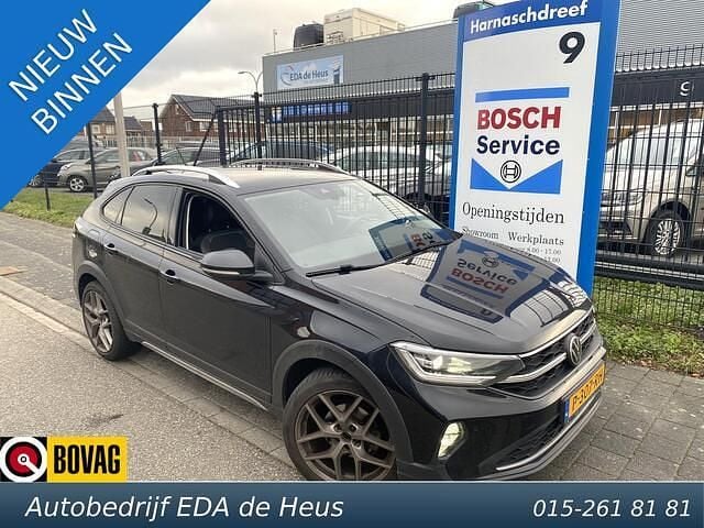 Zwart Gebruikt 2021 VW Taigo Style SUV | € 22.900 (Goede deal) - Afbeelding 1/4