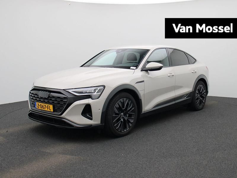 Geel Occasion 2024 Audi Q8 e-tron Advanced SUV | € 59.900 (Eerlijke prijs) - Afbeelding 1/4