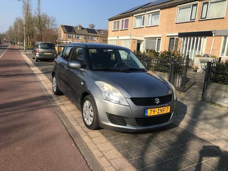 Grijs Gebruikt 2013 Suzuki Swift Comfort Hatchback | € 7.000 (Goede deal) - Afbeelding 1/4