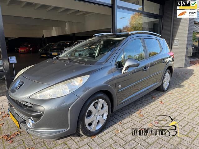 Grijs (metallic) Occasion 2009 Peugeot 207 Outdoor Outdoor Stationwagen | € 2.299 (Eerlijke prijs) - Afbeelding 1/4