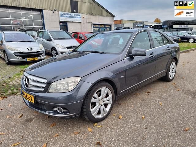Grijs Gebruikt 2010 Mercedes C180 Avantgarde Sedan | € 5.950 (Goede deal) - Afbeelding 1/4