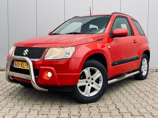 Rood Gebruikt 2007 Suzuki Grand Vitara Exclusive SUV | € 4.999 (Eerlijke prijs) - Afbeelding 1/4