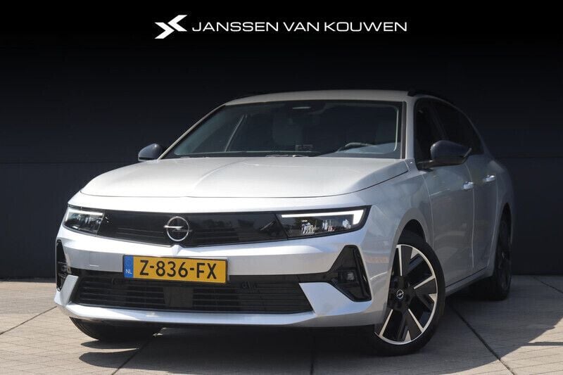 Grijs Gebruikt 2024 Opel Astra Stationwagen | € 27.395 (Goede deal) - Afbeelding 1/4