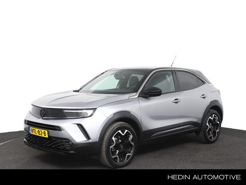 Grijs Gebruikt 2024 Opel Mokka GS Line SUV | € 27.995 (Eerlijke prijs) - Afbeelding 1/4