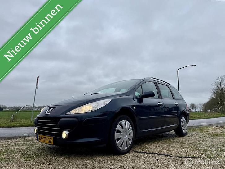 Blauw Gebruikt 2007 Peugeot 307 Premium Stationwagen | € 1.250 (Eerlijke prijs) - Afbeelding 1/4