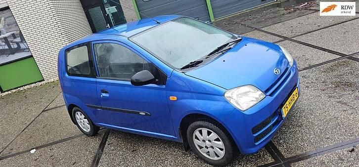 Occasion Daihatsu Cuore 59 PK (43 kW) 2008 Blauw Hatchback