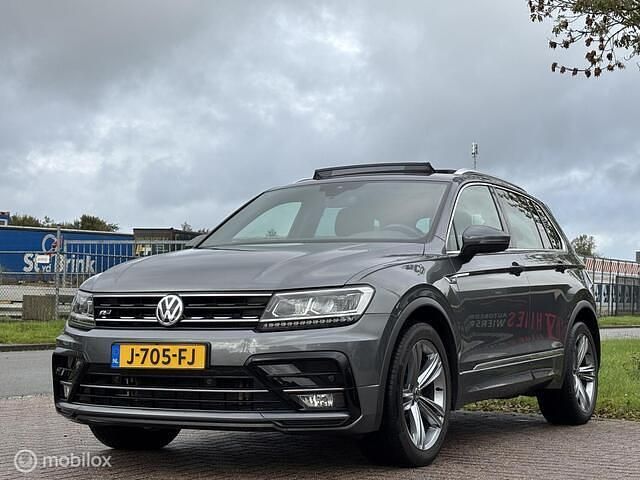 Grijs Gebruikt 2020 VW Tiguan Highline SUV | € 20.900 (Goede deal) - Afbeelding 1/4