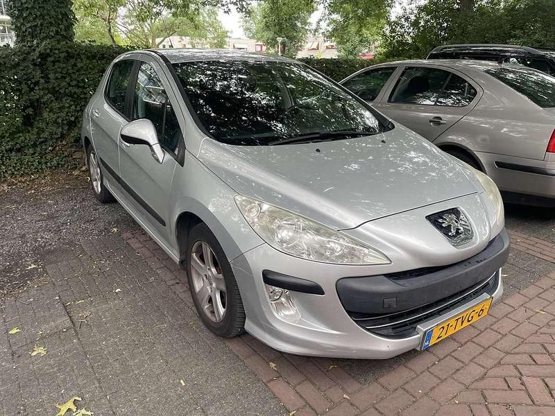 Grijs Gebruikt 2010 Peugeot 308 MPV | € 2.500 (Eerlijke prijs) - Afbeelding 1/4