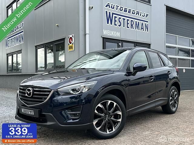 Blauw, metallic lak Gebruikt 2016 Mazda CX-5 SUV | € 20.950 (Eerlijke prijs) - Afbeelding 1/4