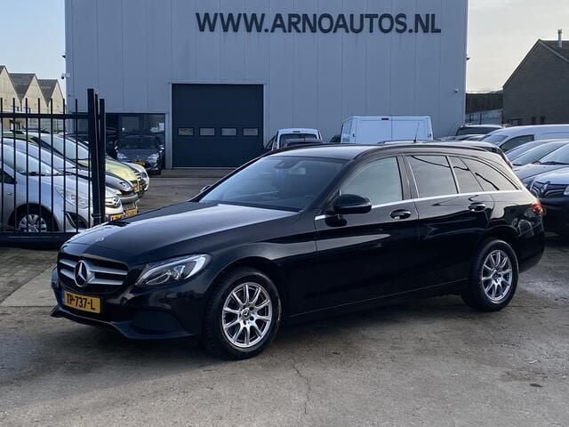 Zwart, metallic lak Gebruikt 2017 Mercedes C200 Premium Stationwagen | € 12.995 (Iets duurder) - Afbeelding 1/4