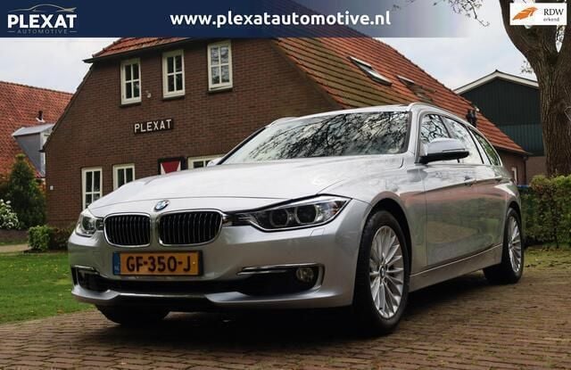 Grijs Gebruikt 2015 BMW 320 Executive Stationwagen | € 18.845 (Eerlijke prijs) - Afbeelding 1/4
