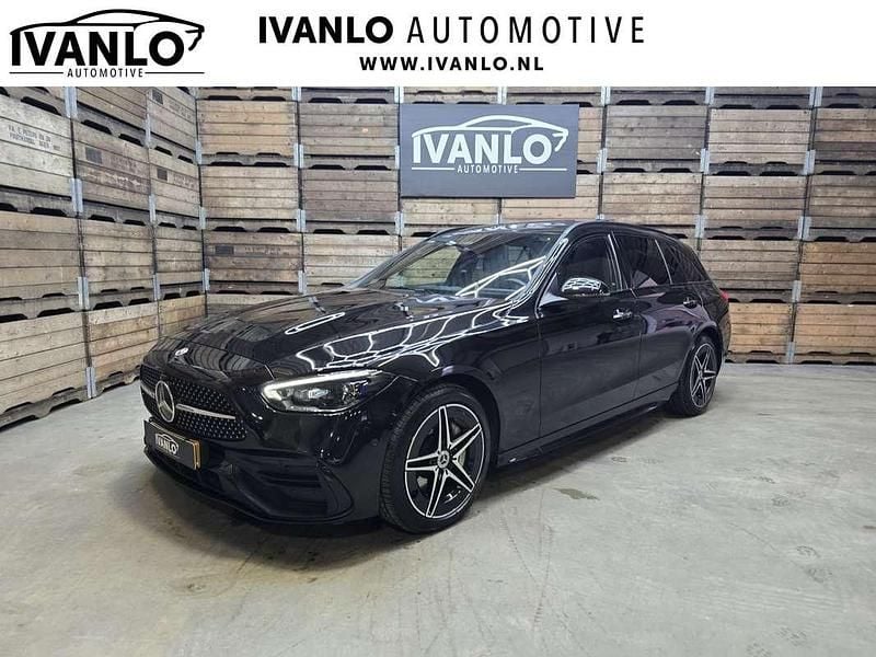 Zwart Occasion 2022 Mercedes C300e AMG line Stationwagen | € 34.800 (Eerlijke prijs) - Afbeelding 1/4