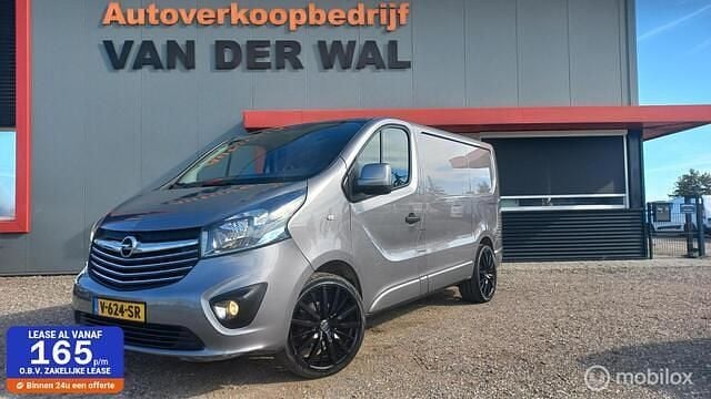 Grijs Gebruikt 2015 Opel Vivaro Selection Van | € 9.999 (Goede deal) - Afbeelding 1/4