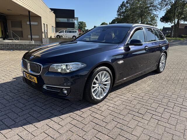 Blauw Gebruikt 2016 BMW 520 Luxury Line Stationwagen | € 23.945 - Afbeelding 1/4