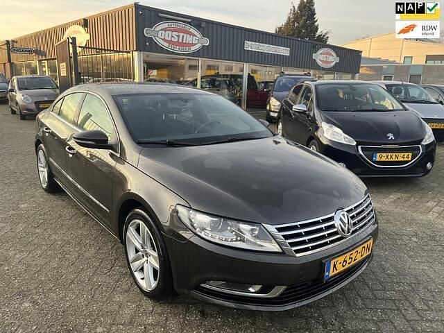 Bruin Gebruikt 2014 VW Passat Sedan | € 8.999 (Eerlijke prijs) - Afbeelding 1/4