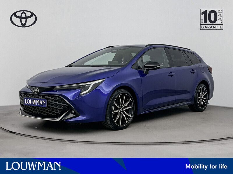 Blauw Gebruikt 2023 Toyota Corolla Hybrid Sport Stationwagen | € 34.950 - Afbeelding 1/3