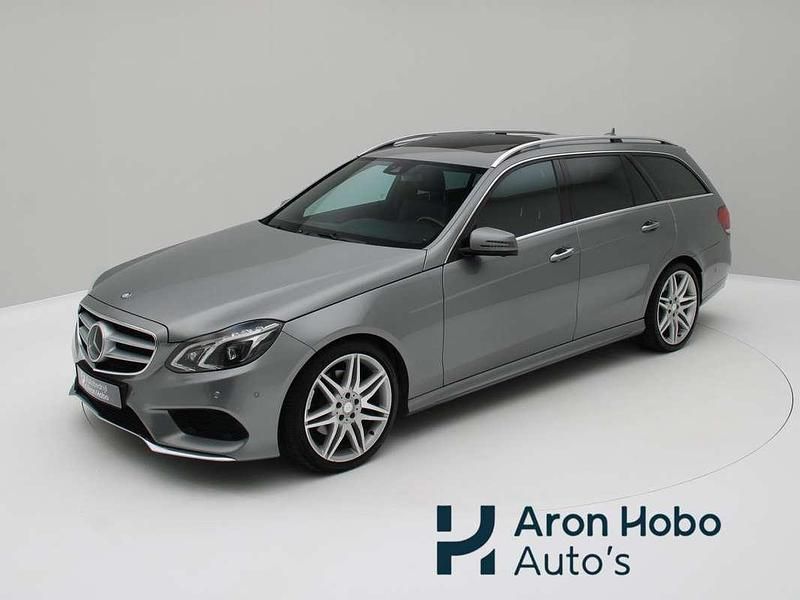 Grijs, metallic lak Gebruikt 2013 Mercedes E350 AMG Stationwagen | € 19.950 - Afbeelding 1/4