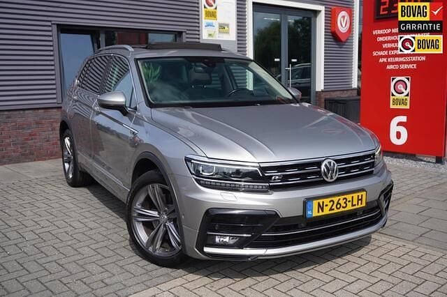 Grijs Gebruikt 2018 VW Tiguan Highline SUV | € 23.795 (Goede deal) - Afbeelding 1/4