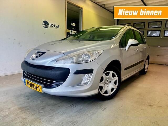 Grijs Gebruikt 2010 Peugeot 308 SW Stationwagen | € 2.495 - Afbeelding 1/4