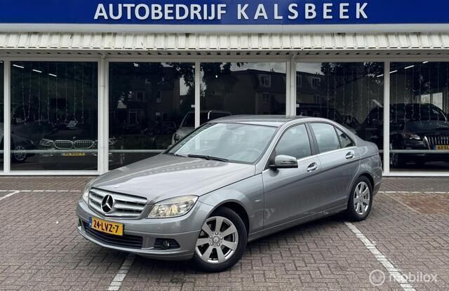 Grijs Gebruikt 2010 Mercedes C180 Business Sedan | € 6.999 (Eerlijke prijs) - Afbeelding 1/4