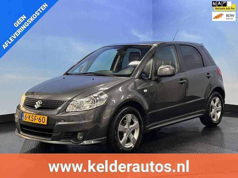 Grijs Gebruikt 2011 Suzuki SX4 Exclusive MPV | € 3.950 (Eerlijke prijs) - Afbeelding 1/4