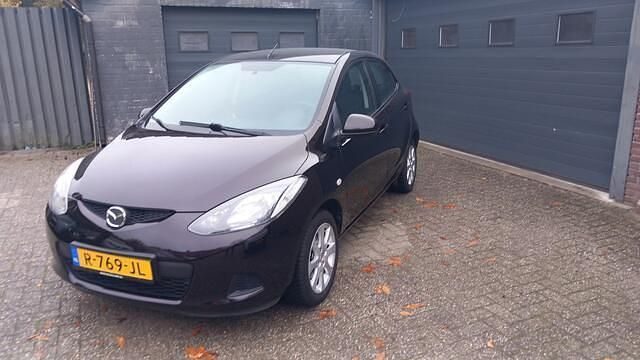 Bruin Gebruikt 2010 Mazda 2 Hatchback | € 4.495 (Eerlijke prijs) - Afbeelding 1/4