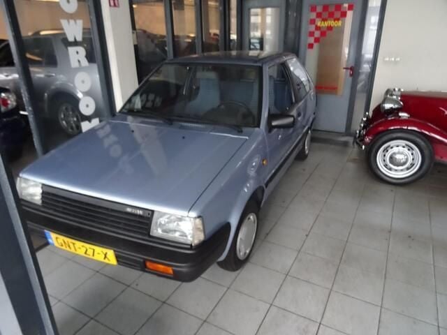 Blauw Gebruikt 1988 Nissan Micra Hatchback | € 3.895 - Afbeelding 1/4