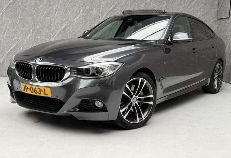 Grijs Gebruikt 2014 BMW 335 Gran Turismo Executive Sedan | € 13.995 - Afbeelding 1/4