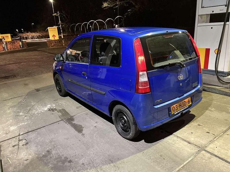 Occasion Daihatsu Cuore 58 PK (42 kW) 2009 Blauw Hatchback