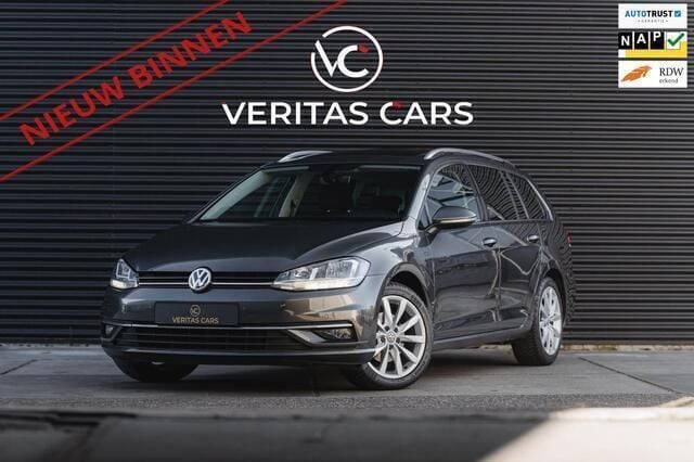 Grijs, metallic lak Gebruikt 2019 VW Golf VII Highline Stationwagen | € 16.950 (Goede deal) - Afbeelding 1/4