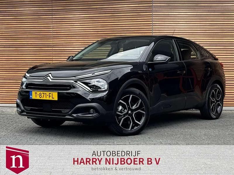 Zwart, metallic lak Gebruikt 2023 Citroën e-C4 Feel SUV | € 18.400 (Super prijs) - Afbeelding 1/4
