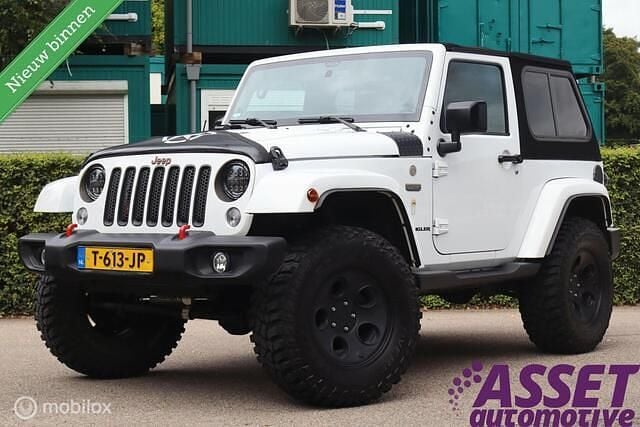 Wit Gebruikt 2016 Jeep Wrangler Sahara SUV | € 39.995 - Afbeelding 1/4