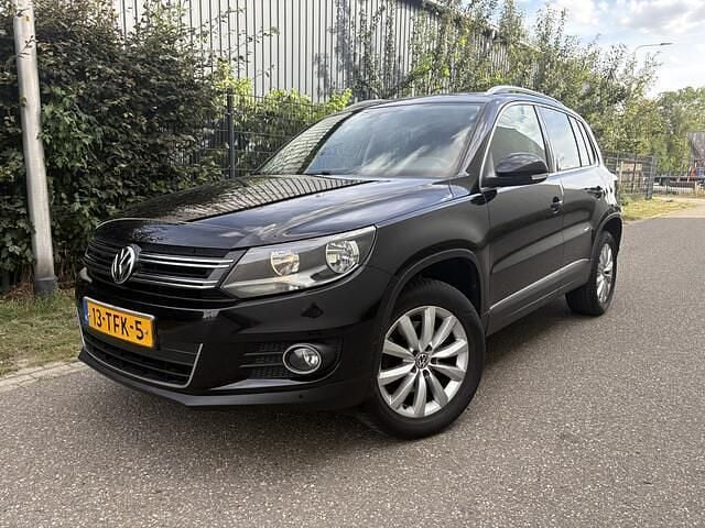Zwart Gebruikt 2012 VW Tiguan Sport SUV | € 7.950 (Goede deal) - Afbeelding 1/4