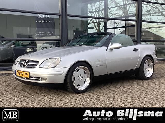 Grijs Occasion 1998 Mercedes SLK230 Cabriolet | € 3.495 (Eerlijke prijs) - Afbeelding 1/4