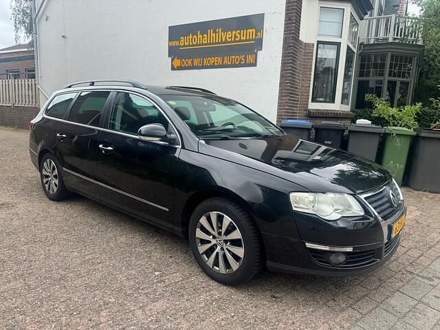 Zwart Gebruikt 2009 VW Passat Comfortline Stationwagen | € 2.499 (Goede deal) - Afbeelding 1/4