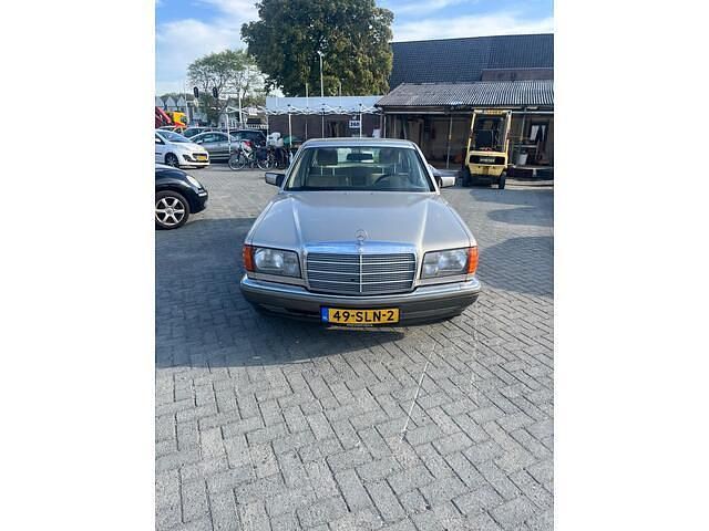 Grijs Gebruikt 1986 Mercedes S420 SE Sedan | € 4.950 - Afbeelding 1/4