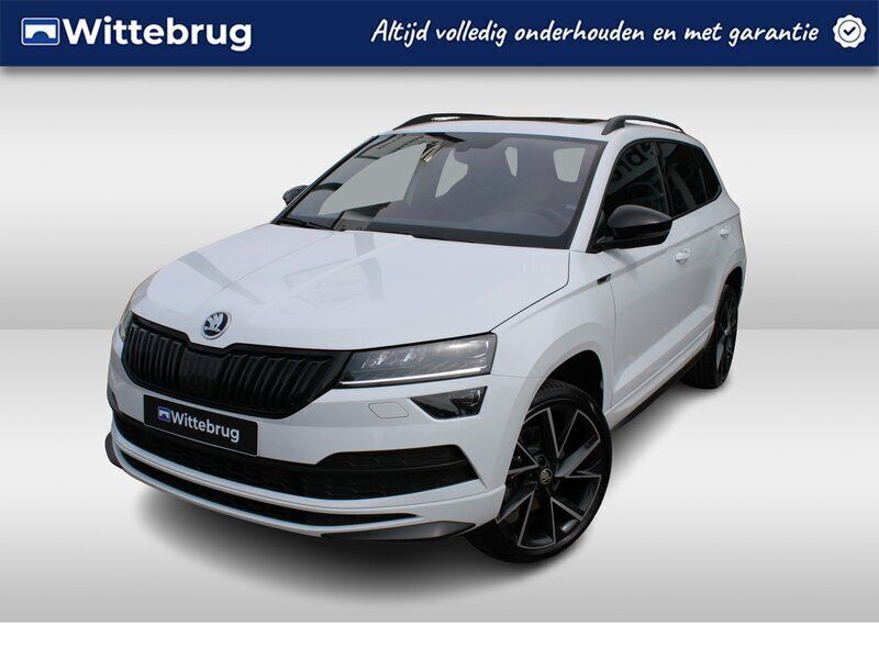 Wit, metallic lak Gebruikt 2022 Skoda Karoq SportLine SUV | € 31.950 (Eerlijke prijs) - Afbeelding 1/2