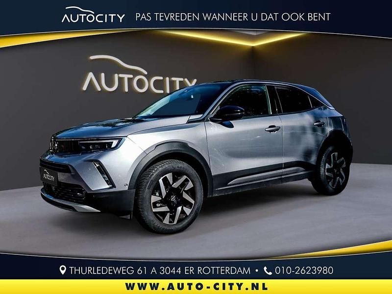 Grijs Gebruikt 2021 Opel Mokka Elegance SUV | € 19.750 (Goede deal) - Afbeelding 1/4