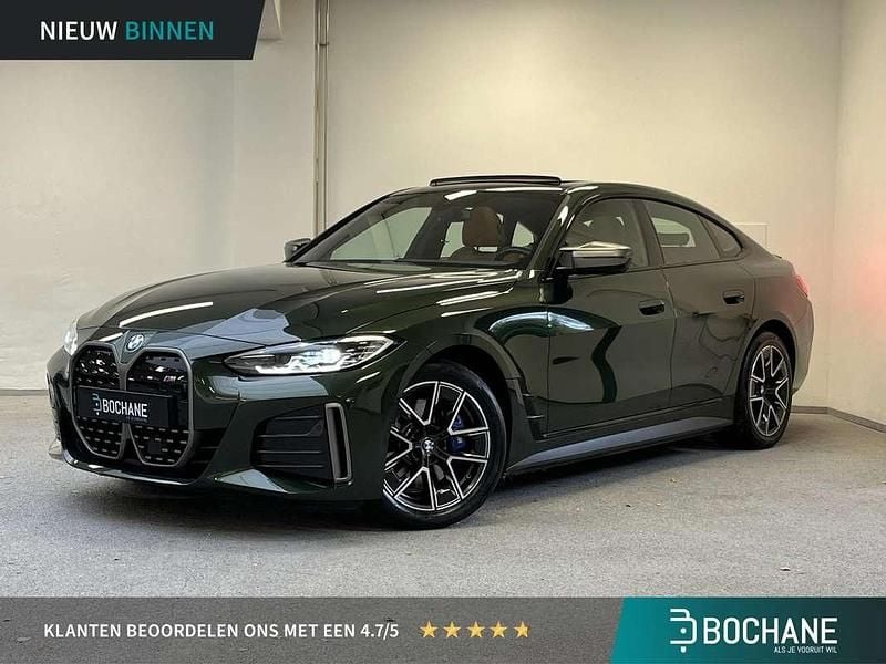Groen Gebruikt 2022 BMW i4 Comfort Edition Sedan | € 45.400 (Goede deal) - Afbeelding 1/4