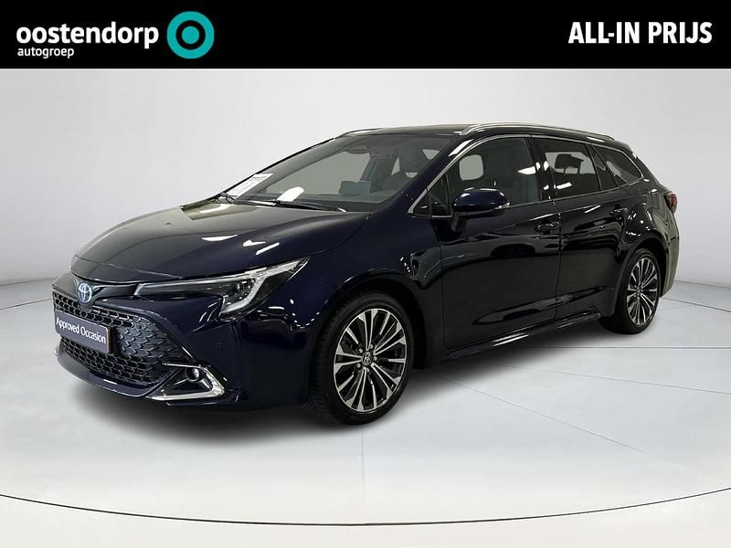 Blauw Gebruikt 2024 Toyota Corolla Hybrid Stationwagen | € 31.850 - Afbeelding 1/4