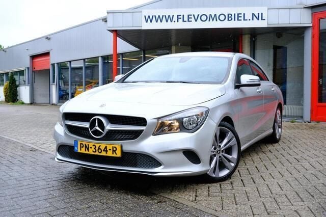 Grijs, metallic lak Gebruikt 2017 Mercedes CLA180 Business Sedan | € 15.450 (Goede deal) - Afbeelding 1/4