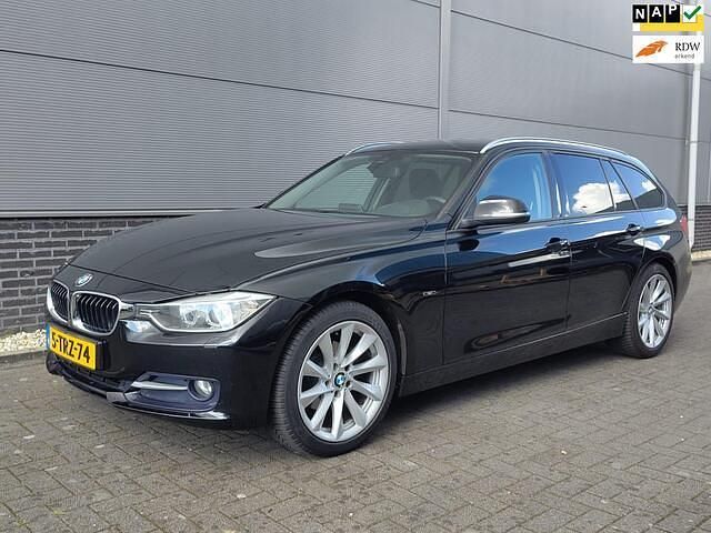 Zwart Gebruikt 2014 BMW 316 Executive Stationwagen | € 9.950 (Goede deal) - Afbeelding 1/4